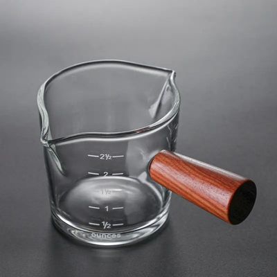 100 ml de copa de medición de vidrio de borosilicato transparente con tapa estilo de diseño minimalista