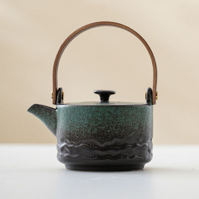 Conjunto de té de Kung Fu de cerámica con mango de viga de elevación tetera compacta de una sola olla
