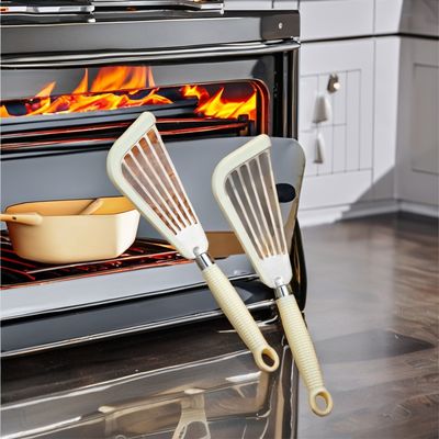 Pans no adhesivo Fritar de silicona Jamón de pescado Turner Espátula con ranura con mango de plástico