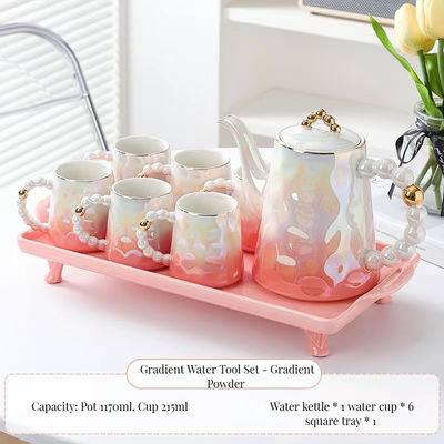 Tazas de café y platillos de cerámica de diseño de perla rosa en forma de concha para los amantes del té