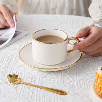 Tazas y platillos modernos de cerámica blanca Nordic Elegant Bone Cup Set para tazas de agua