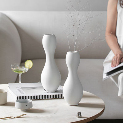 Vaso de cerámica blanco y negro de estilo minimalista moderno, glaseado pigmentado, flor decorativa