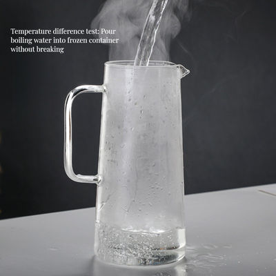 Botella de agua de vidrio de alto borosilicato de 1L/1.4L con filtro de acero inoxidable sostenible
