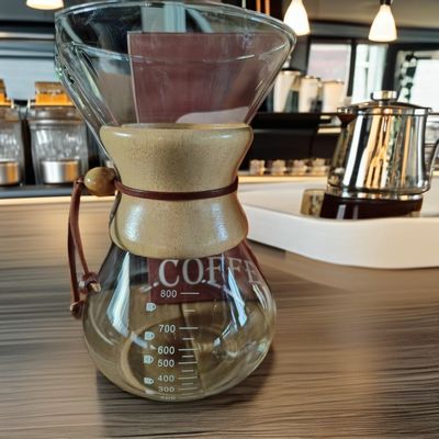 Logotipo personalizado Máquina de café de vidrio de borosilicato de doble pared para una resistencia al calor inusual