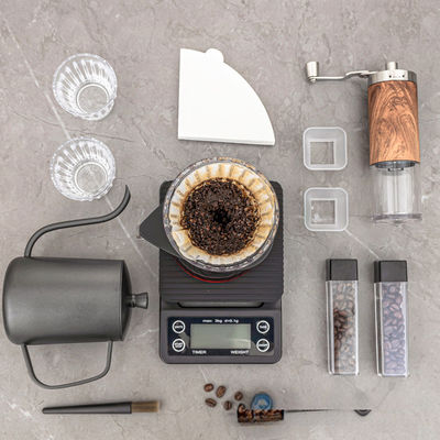 Conjunto de café hecho a mano con tazas de vidrio endurecidas ecológicas de acero inoxidable