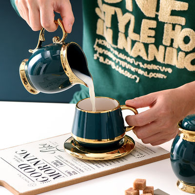 Tazas de café de lujo con borde de oro Cerámica Set de té101 con acero inoxidable