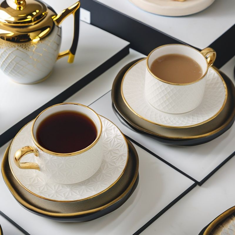 Tazas y platillos modernos de cerámica blanca Nordic Elegant Bone Cup Set para tazas de agua
