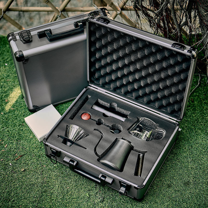 Conjunto de cerámica de vidrio para elaborar café a mano con una olla de filtro de plástico y accesorios de papel